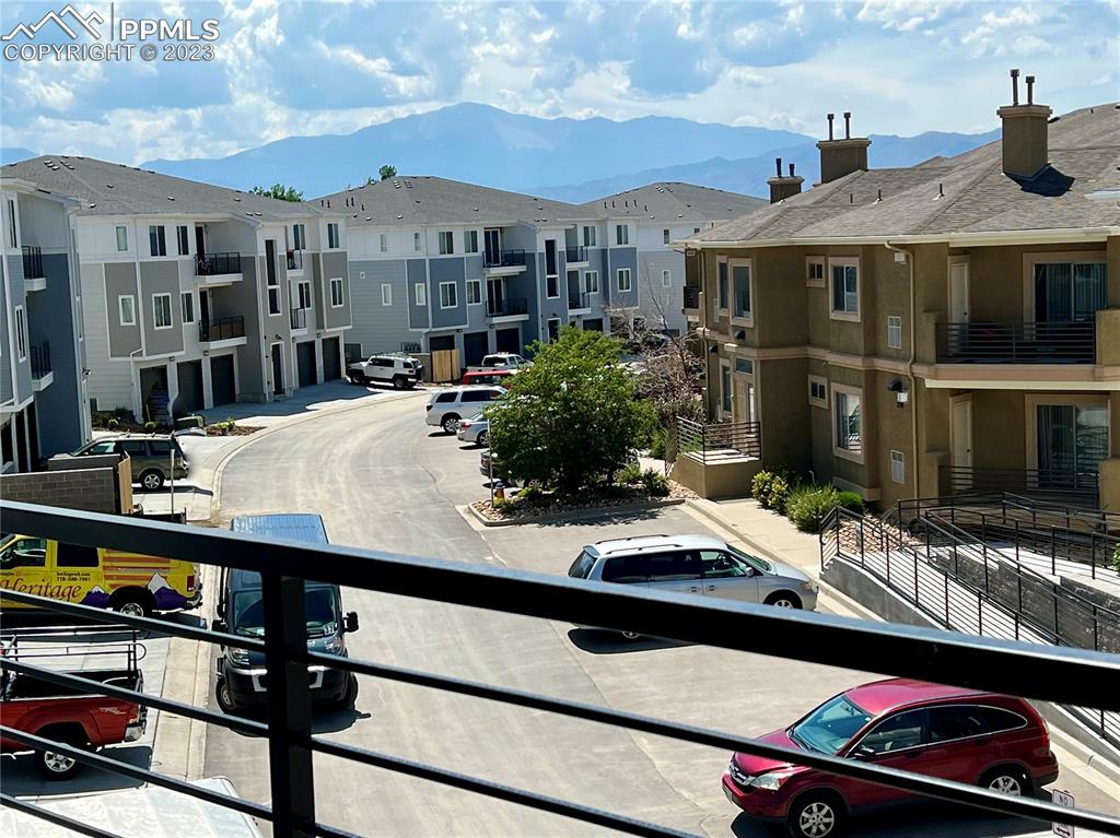 3865 Presidio Point, Unit 202 Colorado Springs, CO 80920 - Photo 23 of 30 a view of a house with backyard