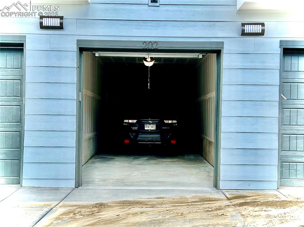 3865 Presidio Point, Unit 202 Colorado Springs, CO 80920 - Photo 27 of 30 a view of front door of a house