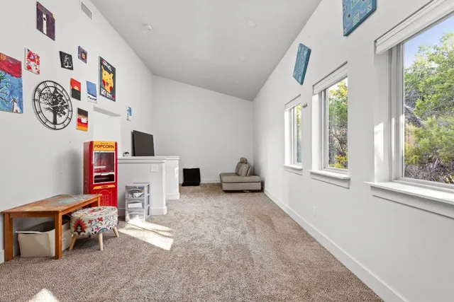 a view of livingroom with furniture and a window