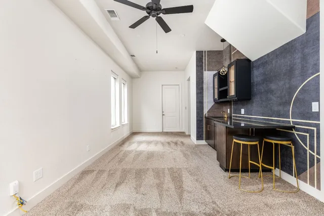 a view of a hallway with chairs