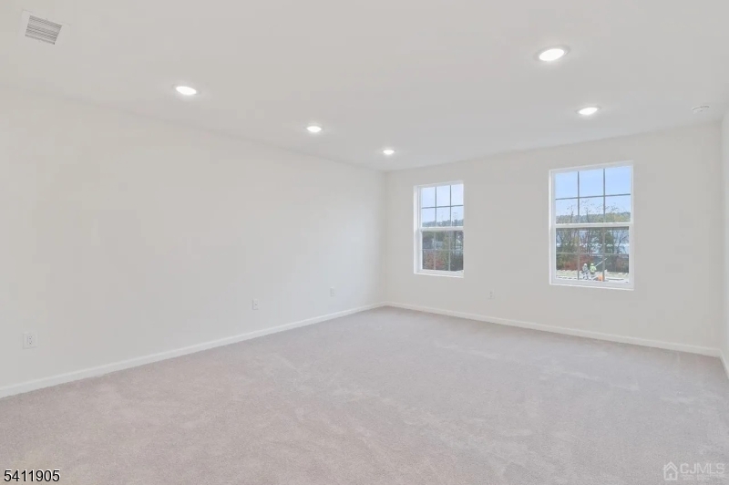 735 Station Road Dunellen, NJ 08812 - Photo 22 of 36 an empty room with windows