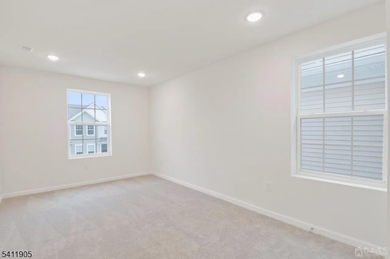735 Station Road Dunellen, NJ 08812 - Photo 28 of 36 an empty room with windows