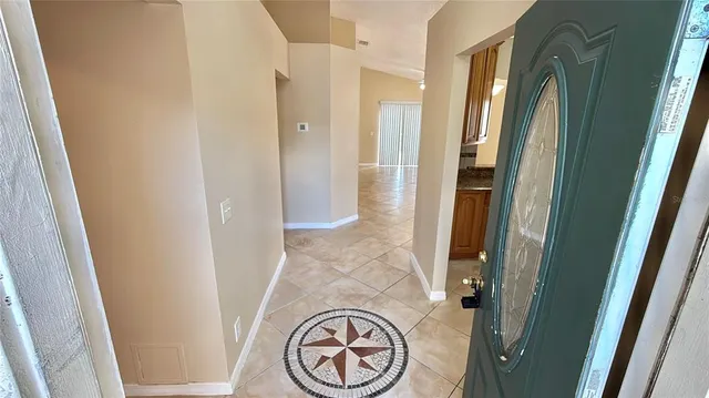 a view of entryway with bathroom