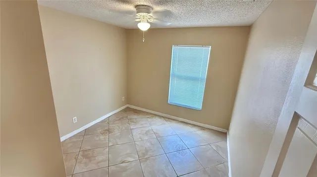 an empty room with a bathroom