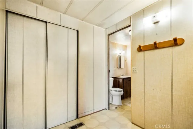 a bathroom with a shower and a toilet