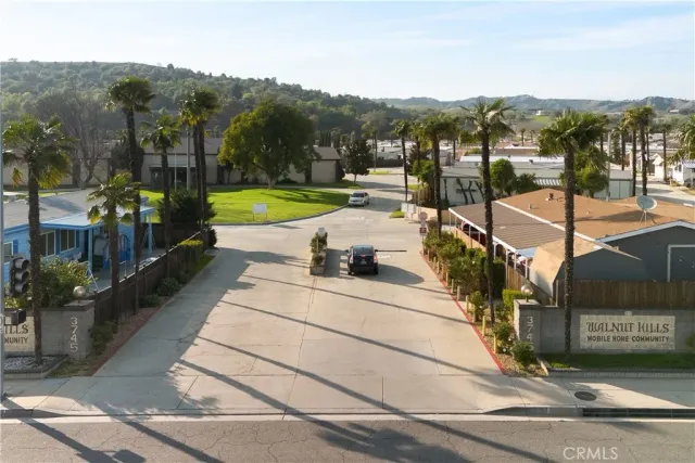 a view of a street with a houses