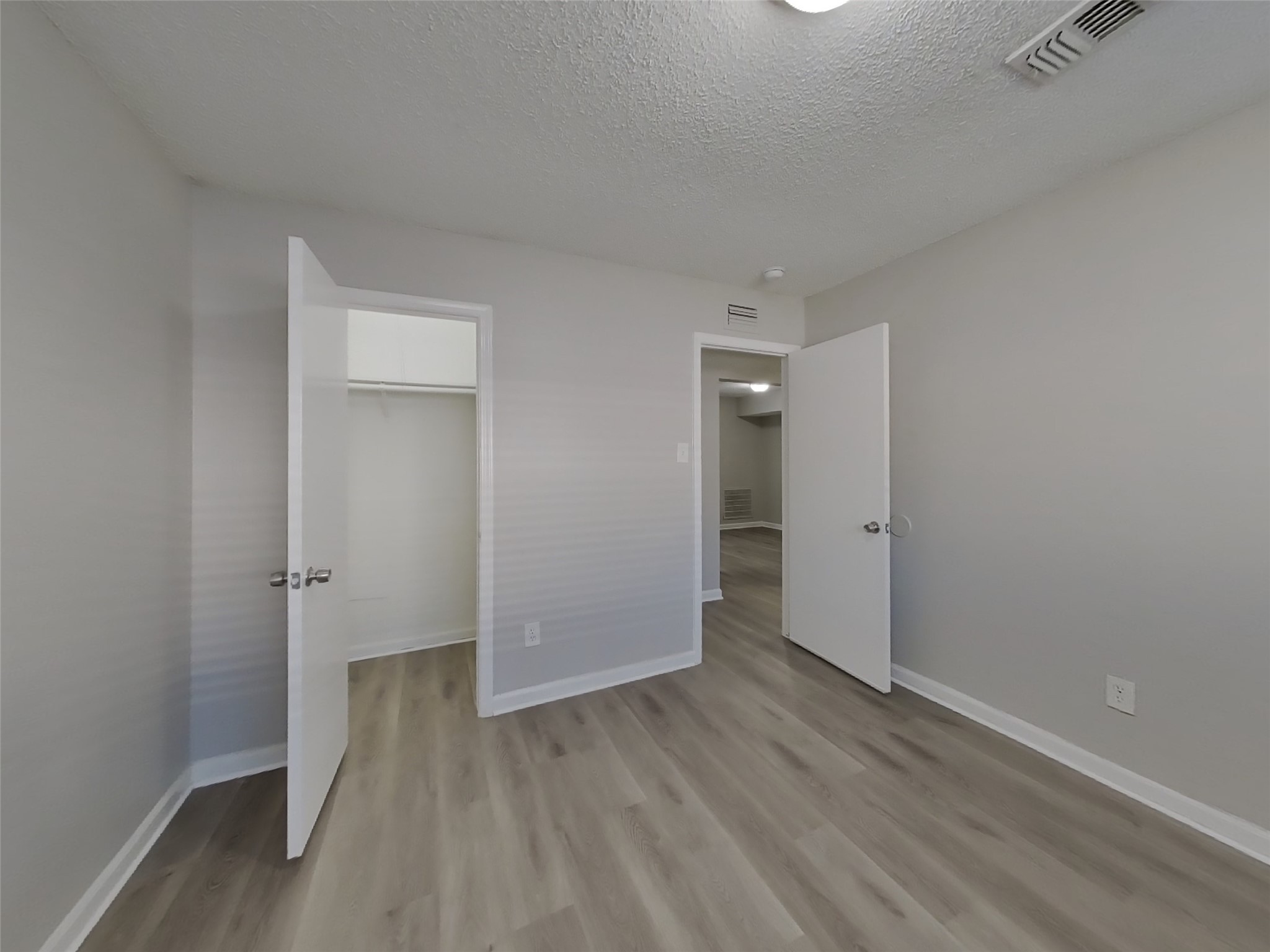 623 Walston Lane Houston, TX 77060 - Photo 12 of 21 a view of a room with wooden floor