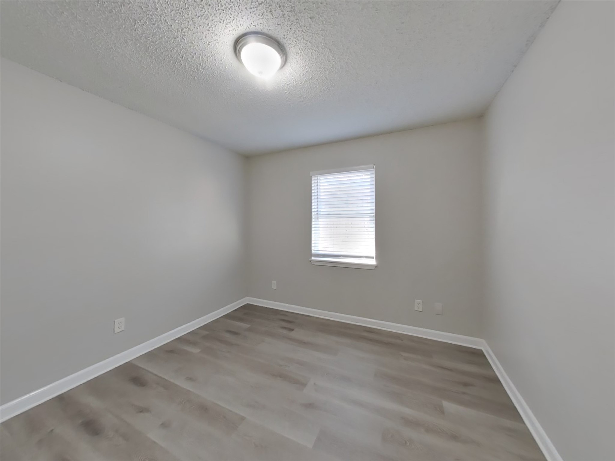623 Walston Lane Houston, TX 77060 - Photo 15 of 21 an empty room with a window