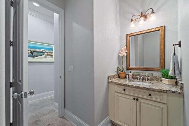 1900 Baytowne Loop Miramar Beach, FL 32550 - Photo 31 of 44 a bathroom with a granite countertop sink and a mirror