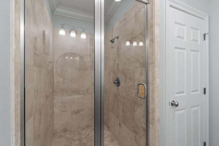 1900 Baytowne Loop Miramar Beach, FL 32550 - Photo 33 of 44 a bathroom with a glass shower door