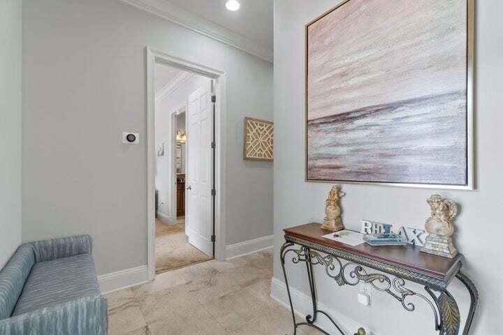 1900 Baytowne Loop Miramar Beach, FL 32550 - Photo 6 of 44 a view of a bedroom with furniture and wooden floor