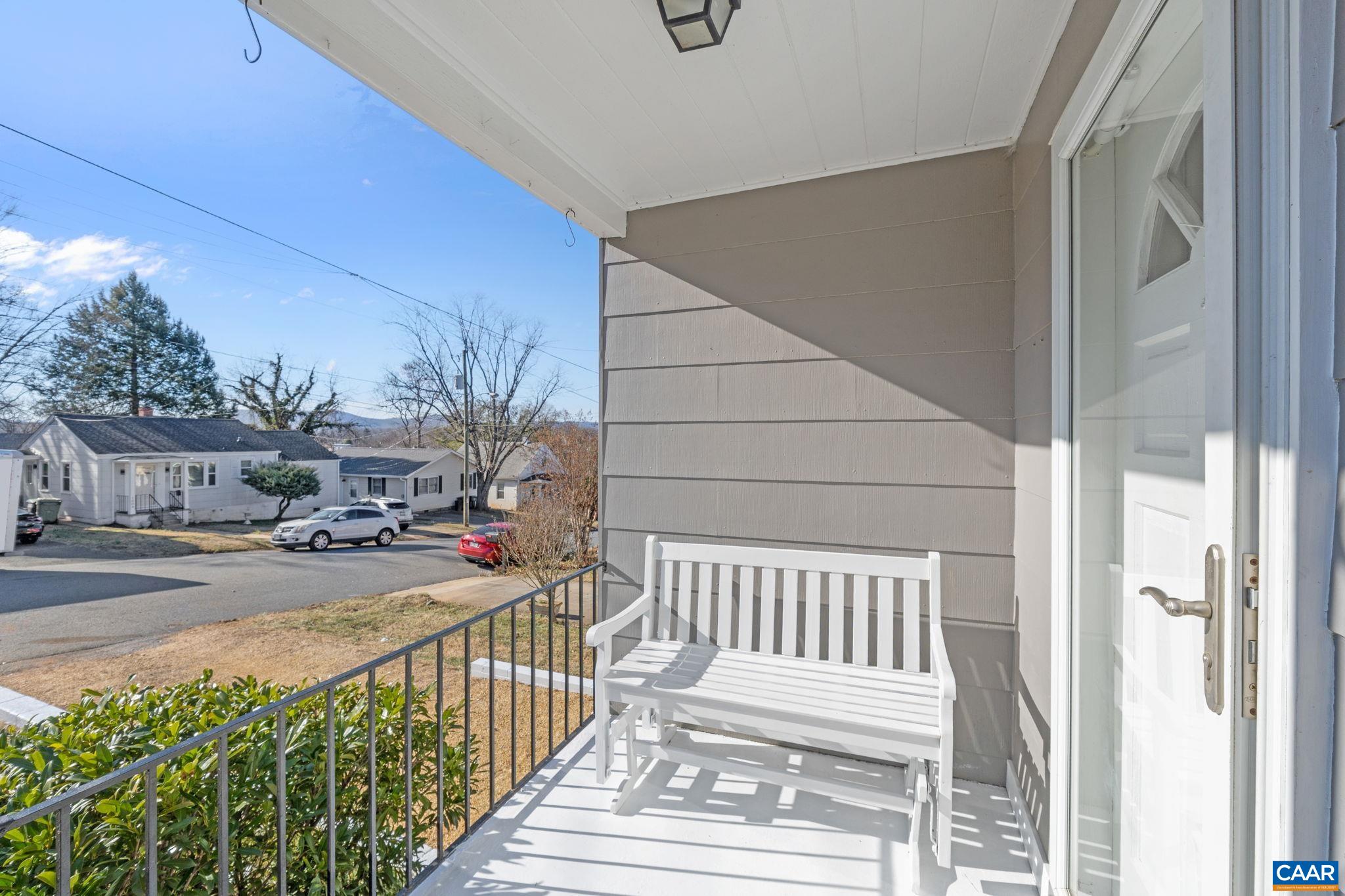 1007 Montrose Avenue Charlottesville, VA 22902 - Photo 3 of 37 a view of a porch with wooden floor and fence