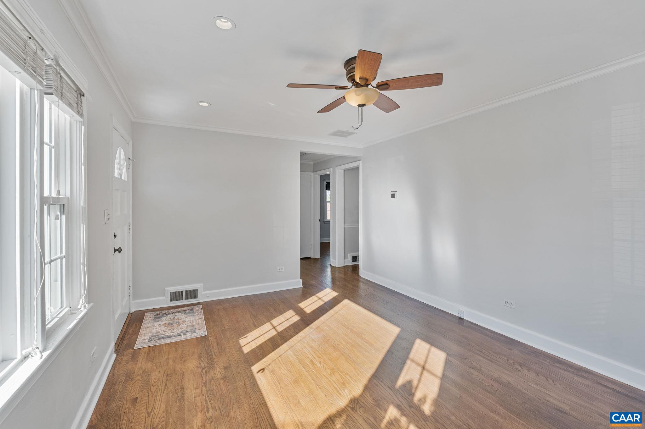 1007 Montrose Avenue Charlottesville, VA 22902 - Photo 8 of 37 a bedroom with a bed and a chandelier