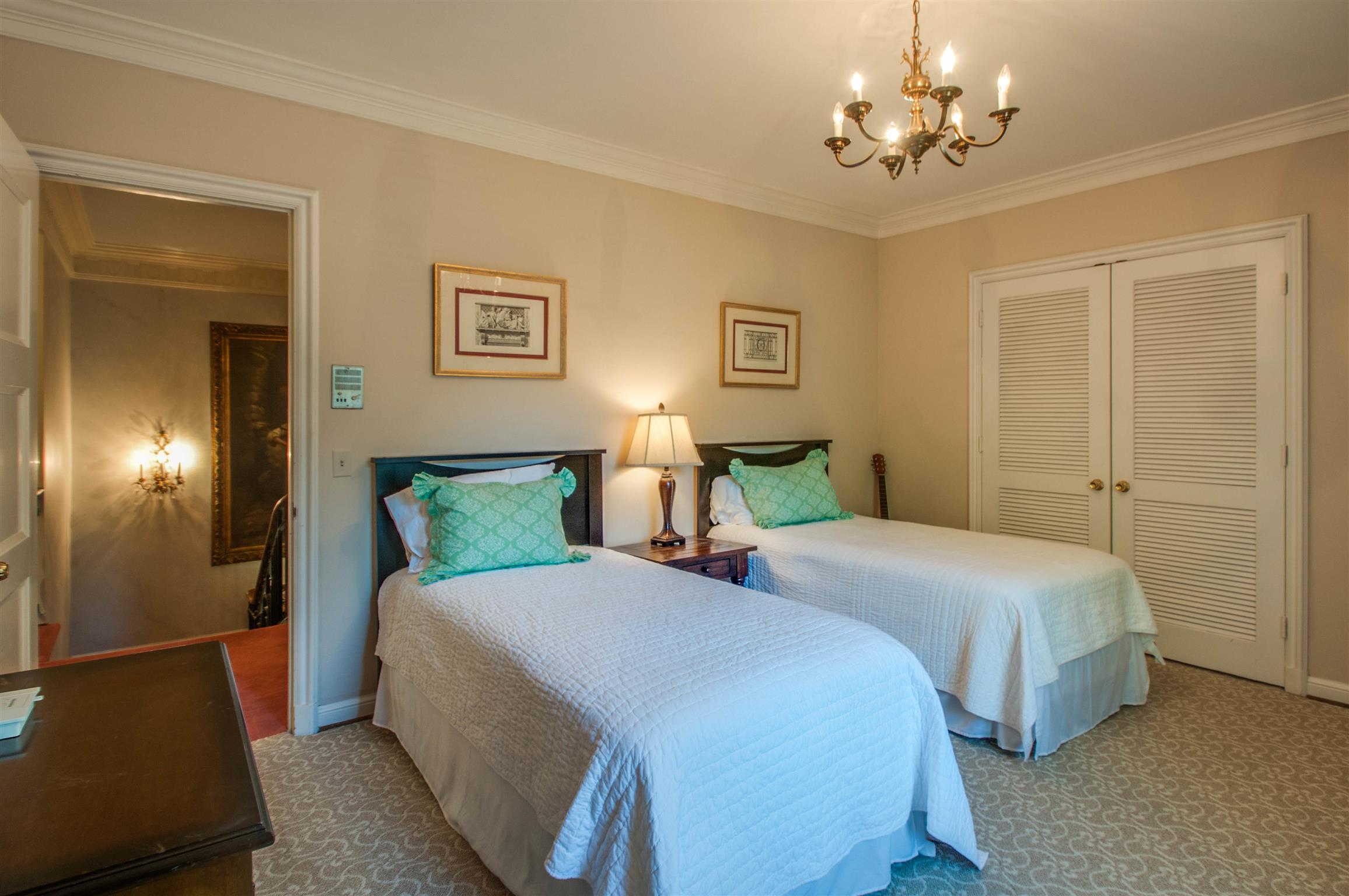 4727 Post Road Nashville, TN 37205 - Photo 19 of 28 a bedroom with double bed and a chandelier