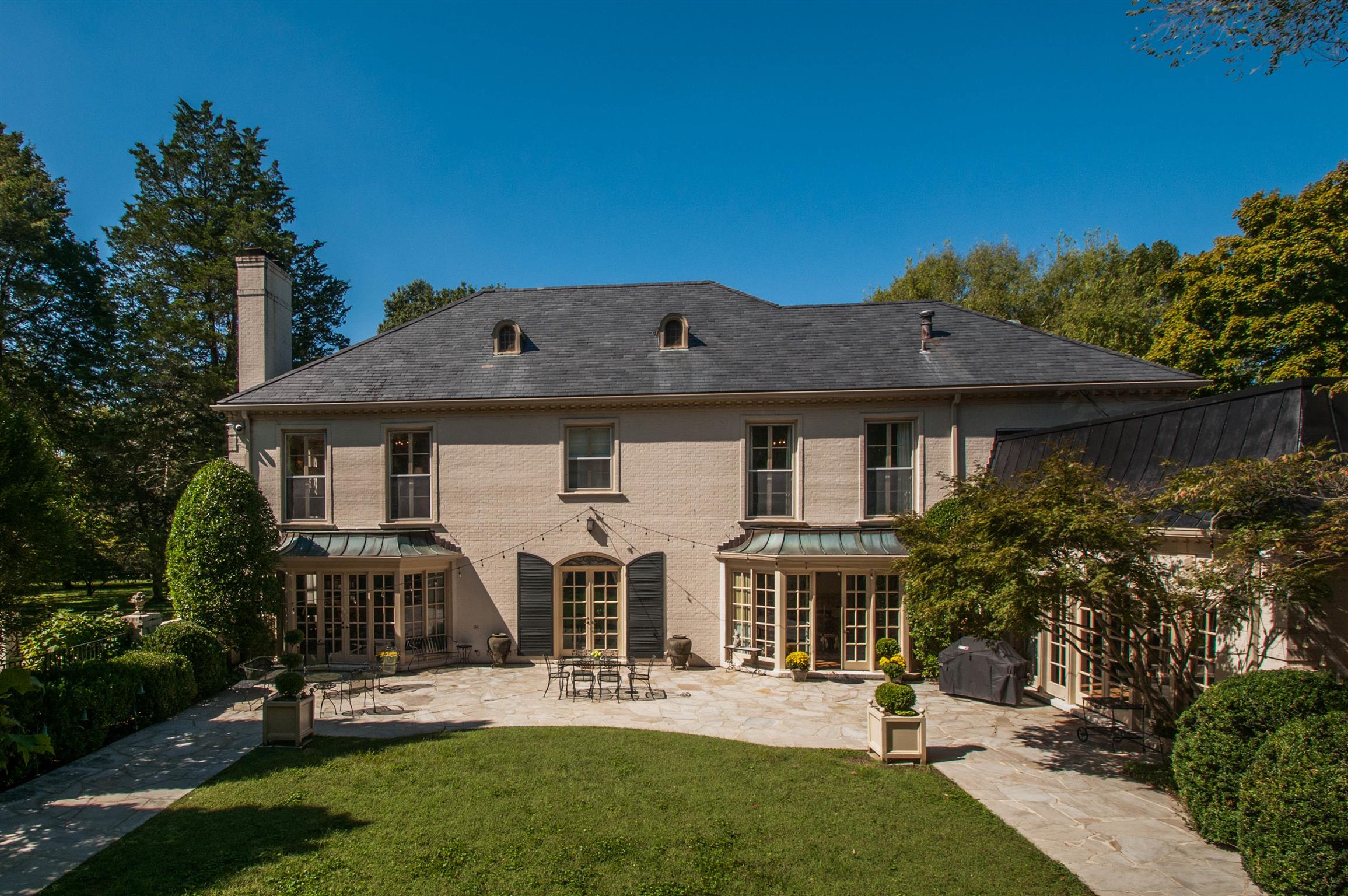 4727 Post Road Nashville, TN 37205 - Photo 23 of 28 a front view of a house with a yard