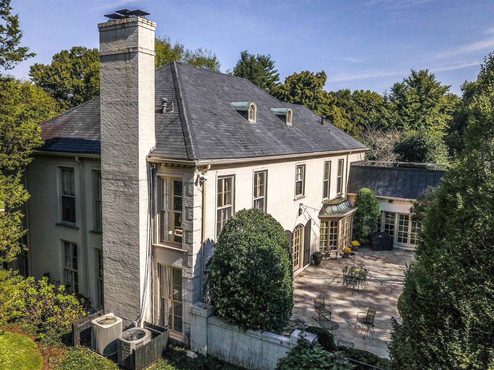 4727 Post Road Nashville, TN 37205 - Photo 26 of 28 a front view of a house with garden