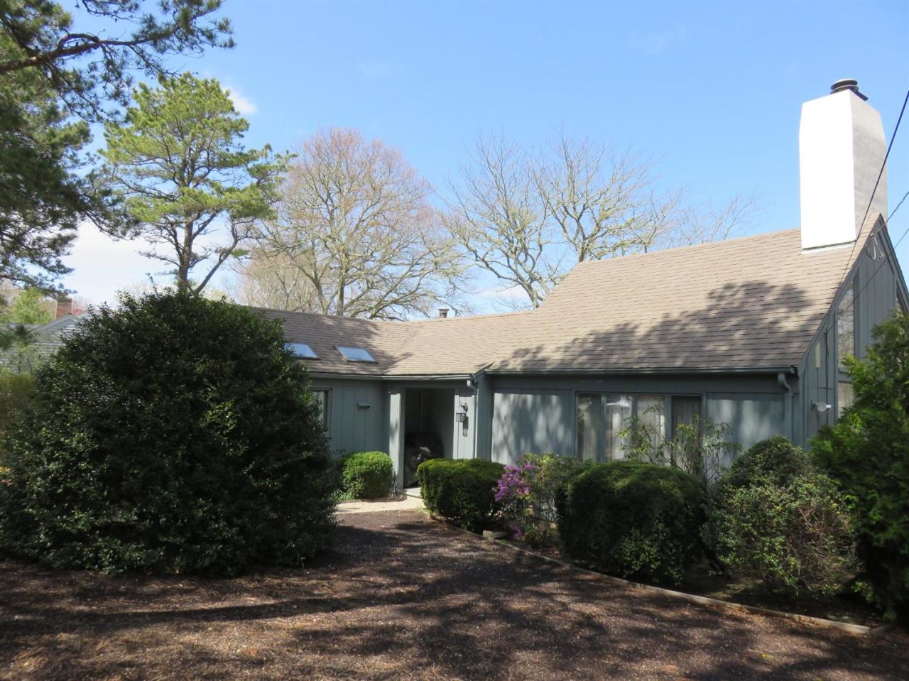 126 Wading Place Road Mashpee, MA 02649 - Photo 2 of 27 a view of a house with a patio