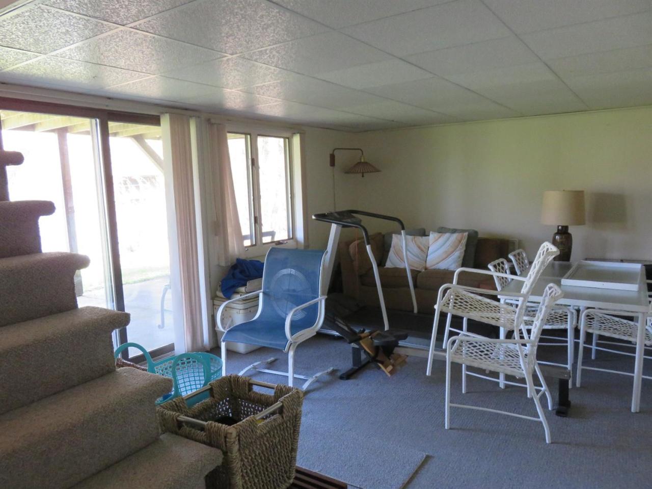 126 Wading Place Road Mashpee, MA 02649 - Photo 27 of 27 a view of a livingroom with furniture and windows