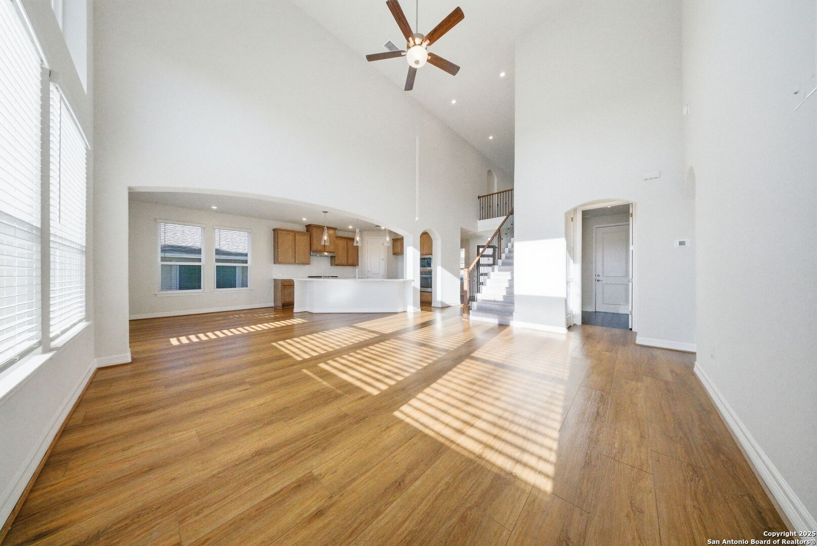 662 Hidden View Street New Braunfels, TX 78130 - Photo 12 of 48 a view of a livingroom with wooden floor and a window