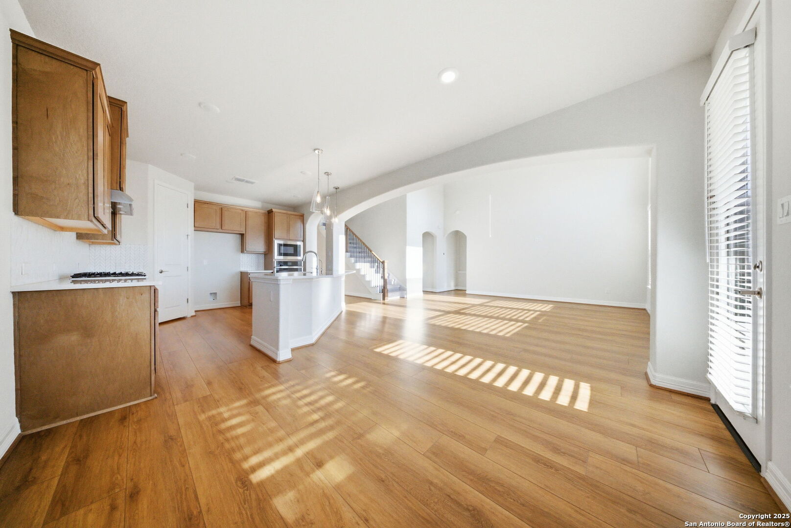 662 Hidden View Street New Braunfels, TX 78130 - Photo 15 of 48 a view of kitchen and hall with wooden floor