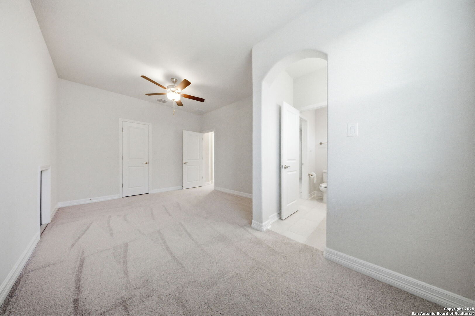662 Hidden View Street New Braunfels, TX 78130 - Photo 36 of 48 an empty room with fan and a ceiling fan