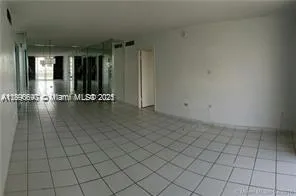 an empty room with sliding door