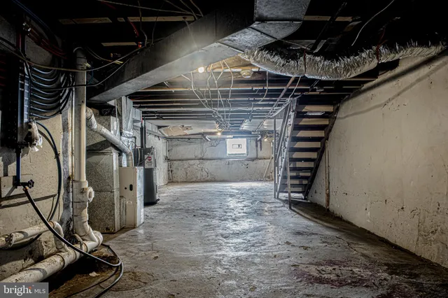 a view of room with wooden floor