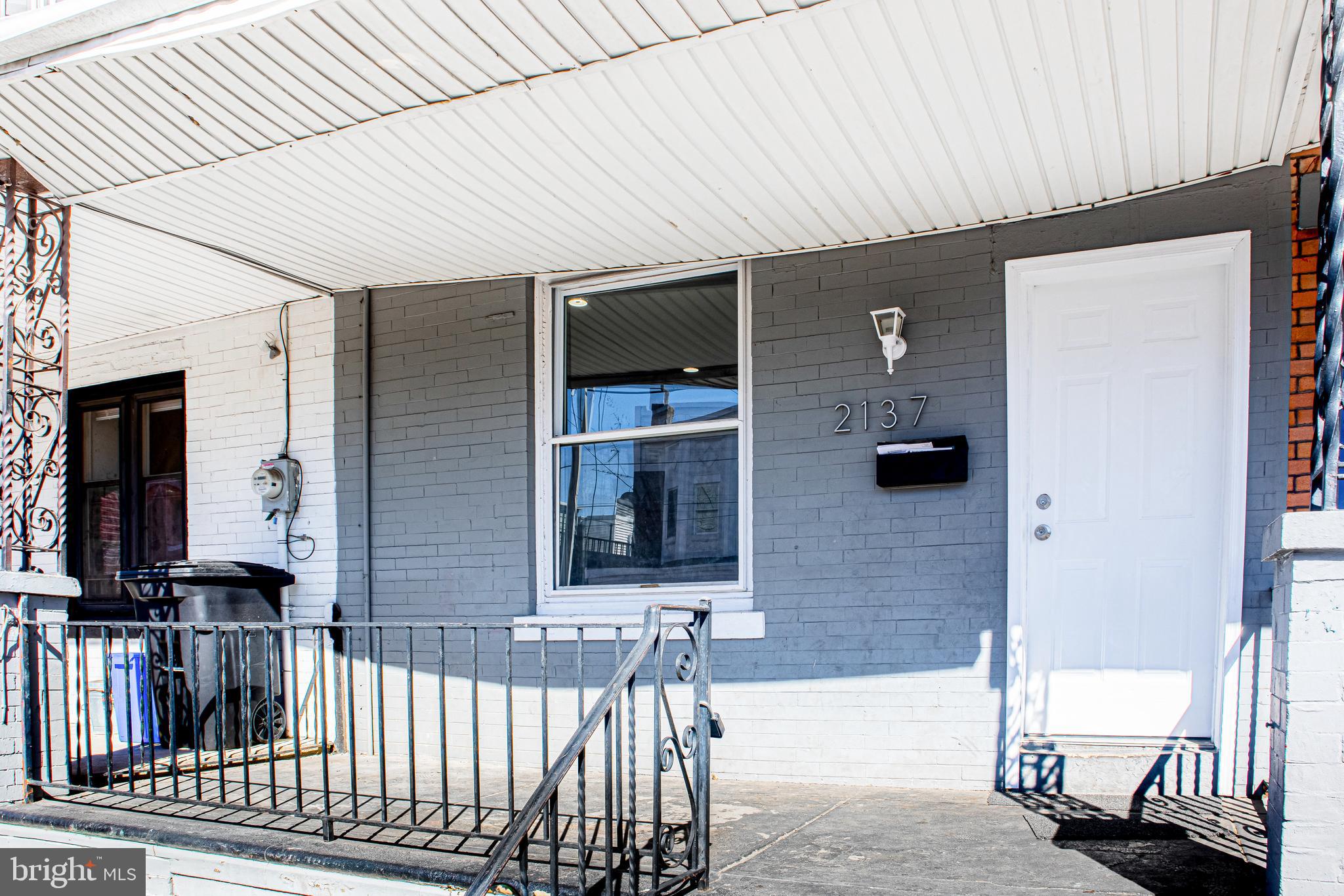 2137 Mifflin Street Philadelphia, PA 19145 - Photo 21 of 21 a bathroom with a sink and a mirror