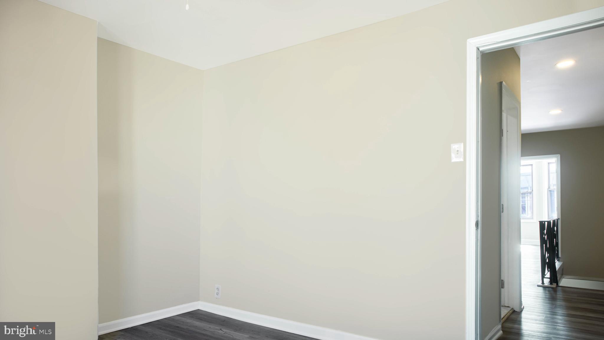 2137 Mifflin Street Philadelphia, PA 19145 - Photo 9 of 21 a view of a hallway with wooden floor