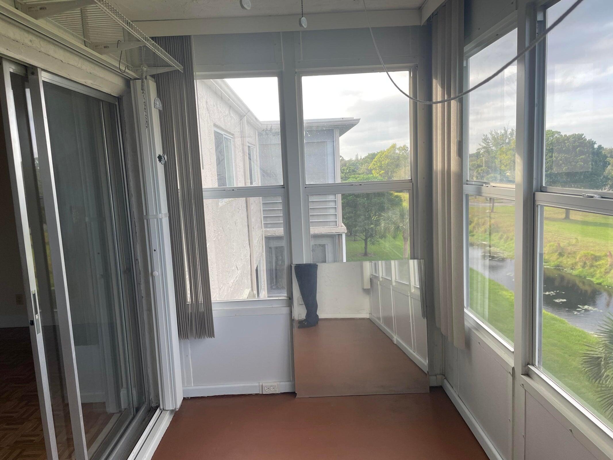 725 Lori Drive, Unit 406 Palm Springs, FL 33461 - Photo 11 of 40 a view of front door