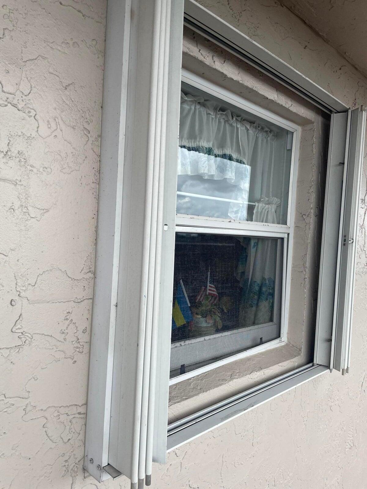 725 Lori Drive, Unit 406 Palm Springs, FL 33461 - Photo 13 of 40 a close view of fireplace