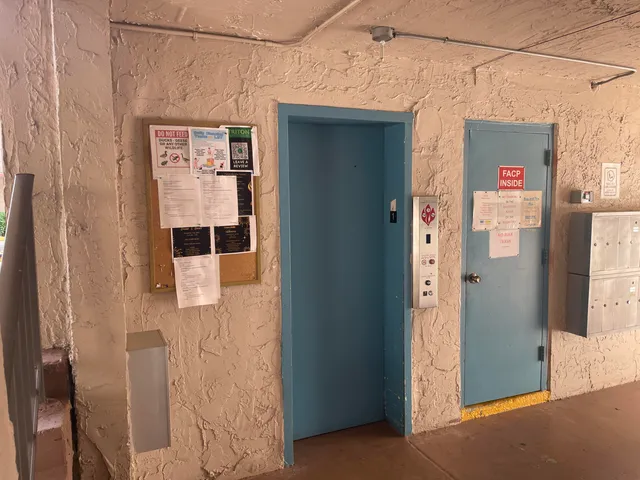 a bathroom with a shower and a sink