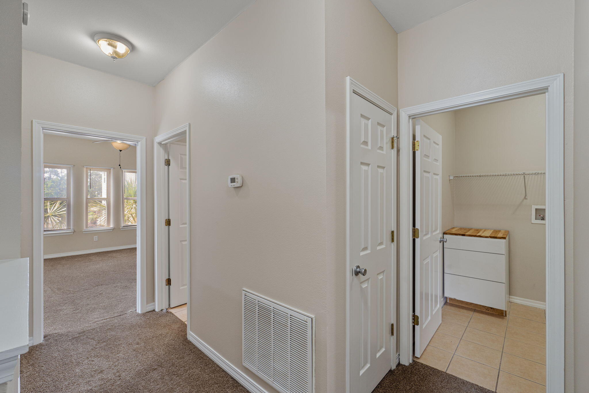 171 Enchanted Way Santa Rosa Beach, FL 32459 - Photo 21 of 37 Upstairs to Laundry & Bathroom