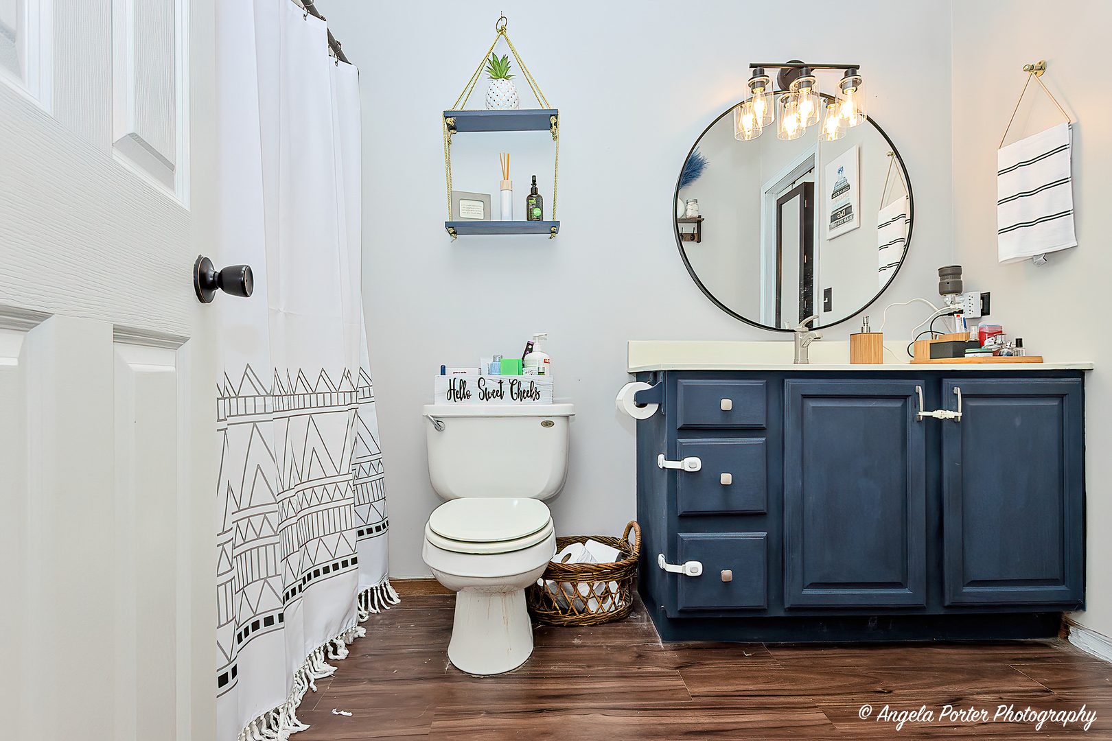119 Eagle Point Road Fox Lake, IL 60020 - Photo 12 of 29 a bathroom with a toilet a sink and a mirror