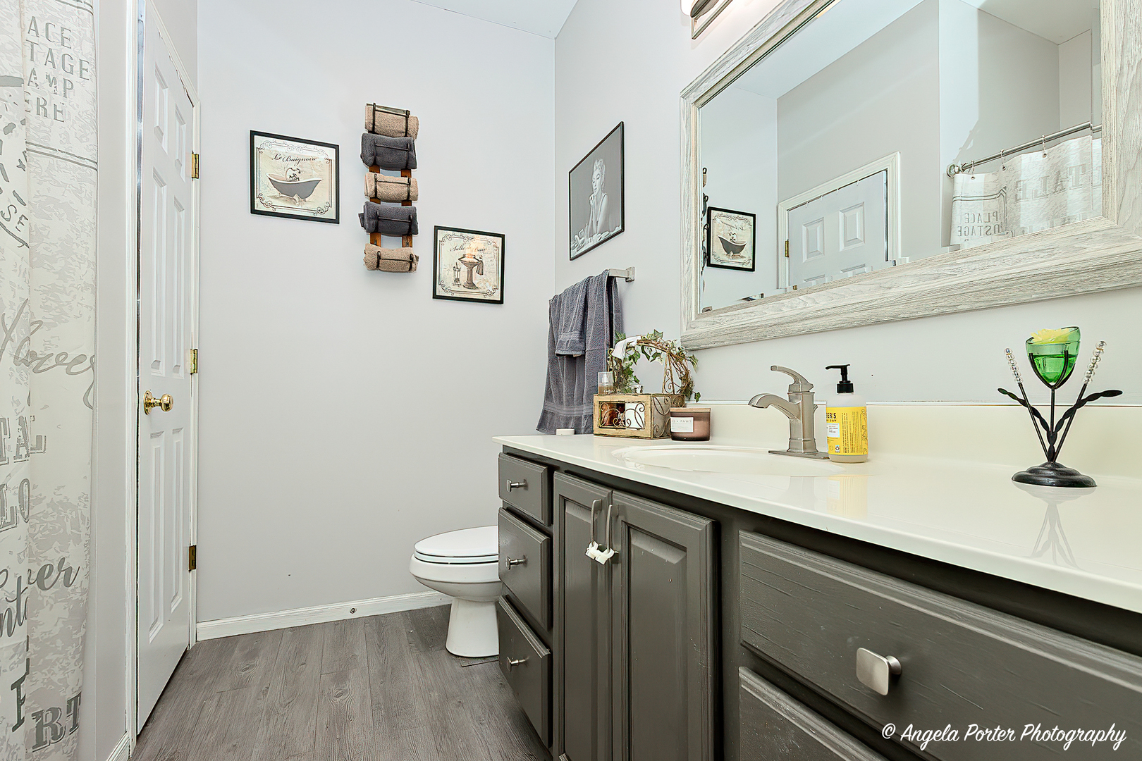 119 Eagle Point Road Fox Lake, IL 60020 - Photo 15 of 29 a bathroom with a sink a toilet and a mirror
