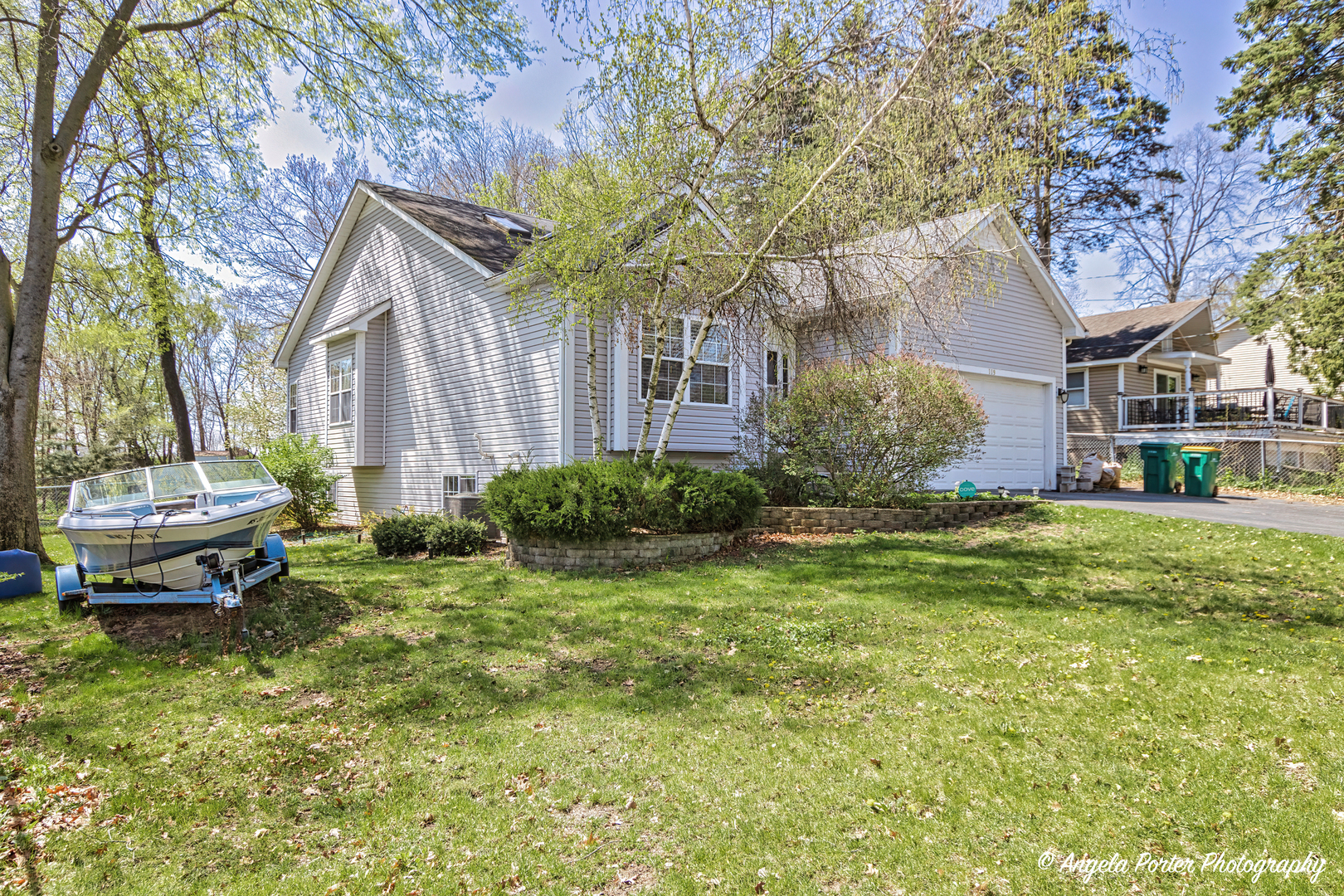 119 Eagle Point Road Fox Lake, IL 60020 - Photo 2 of 29 a view of a house with backyard and garden