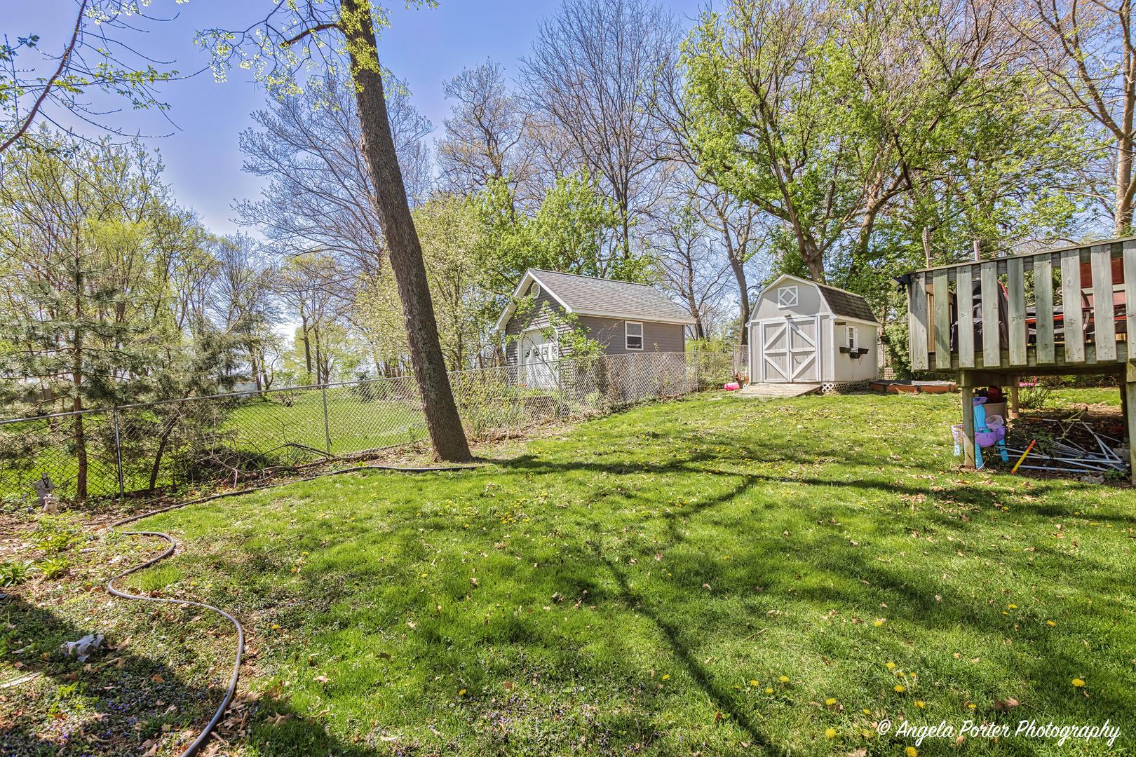119 Eagle Point Road Fox Lake, IL 60020 - Photo 24 of 29 a view of a yard with plants and trees