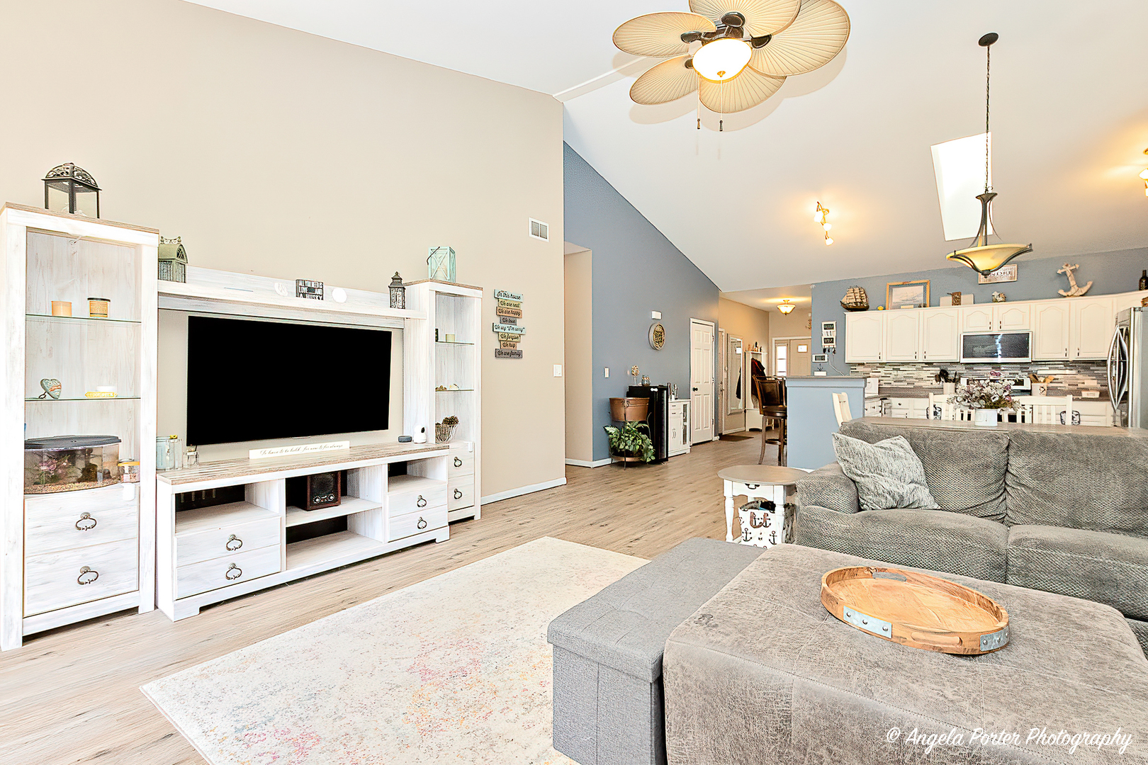 119 Eagle Point Road Fox Lake, IL 60020 - Photo 7 of 29 a living room with furniture and a flat screen tv