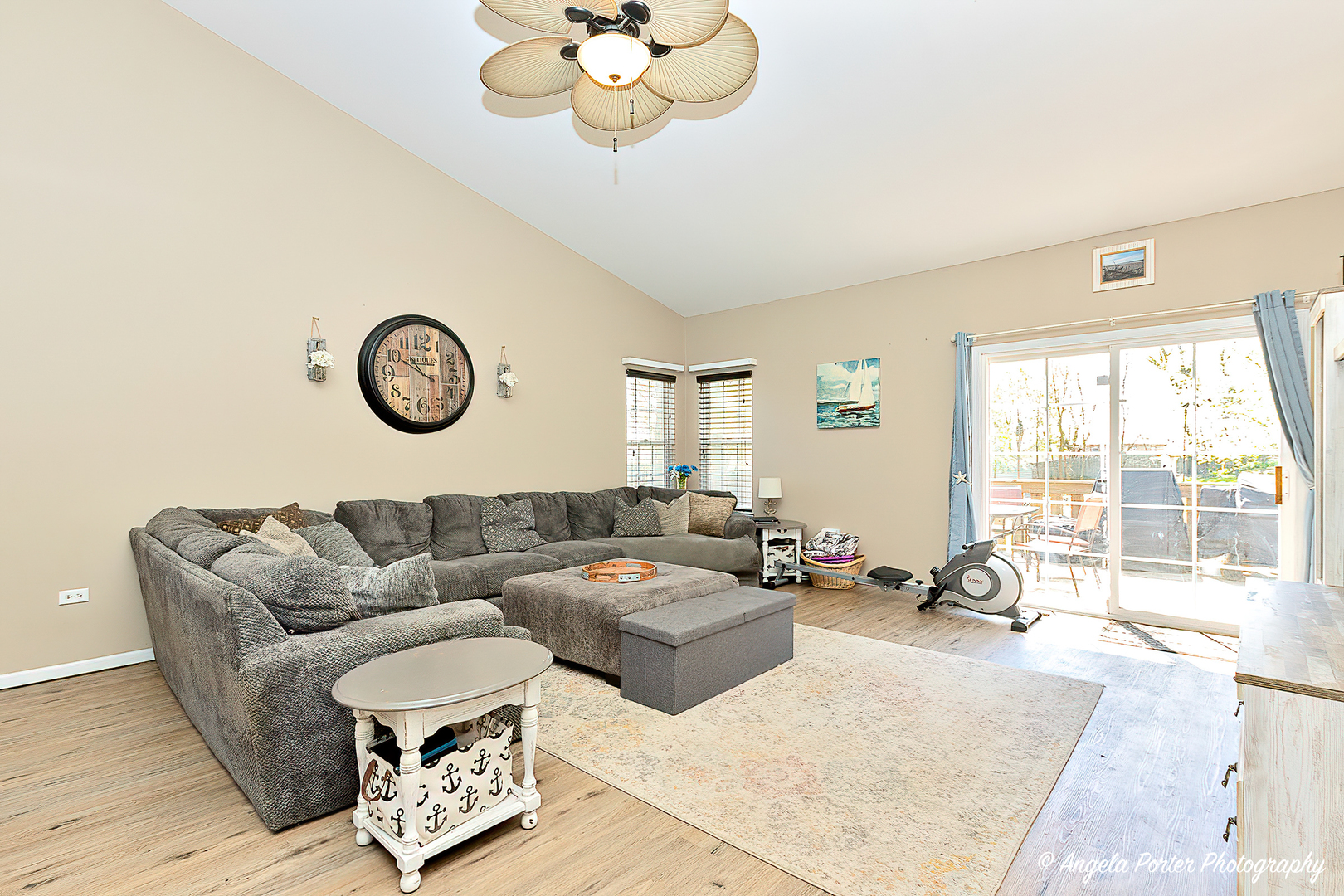 119 Eagle Point Road Fox Lake, IL 60020 - Photo 9 of 29 a living room with furniture a rug and a large window