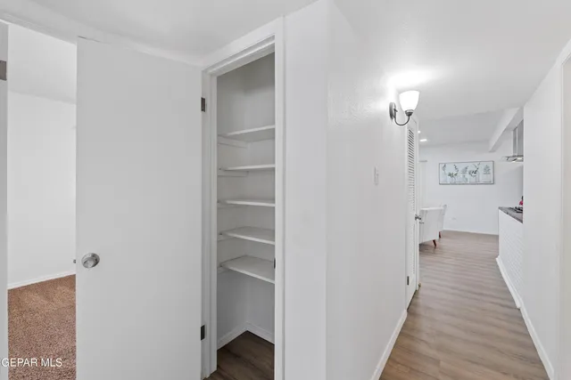 a view of a bathroom from the hallway