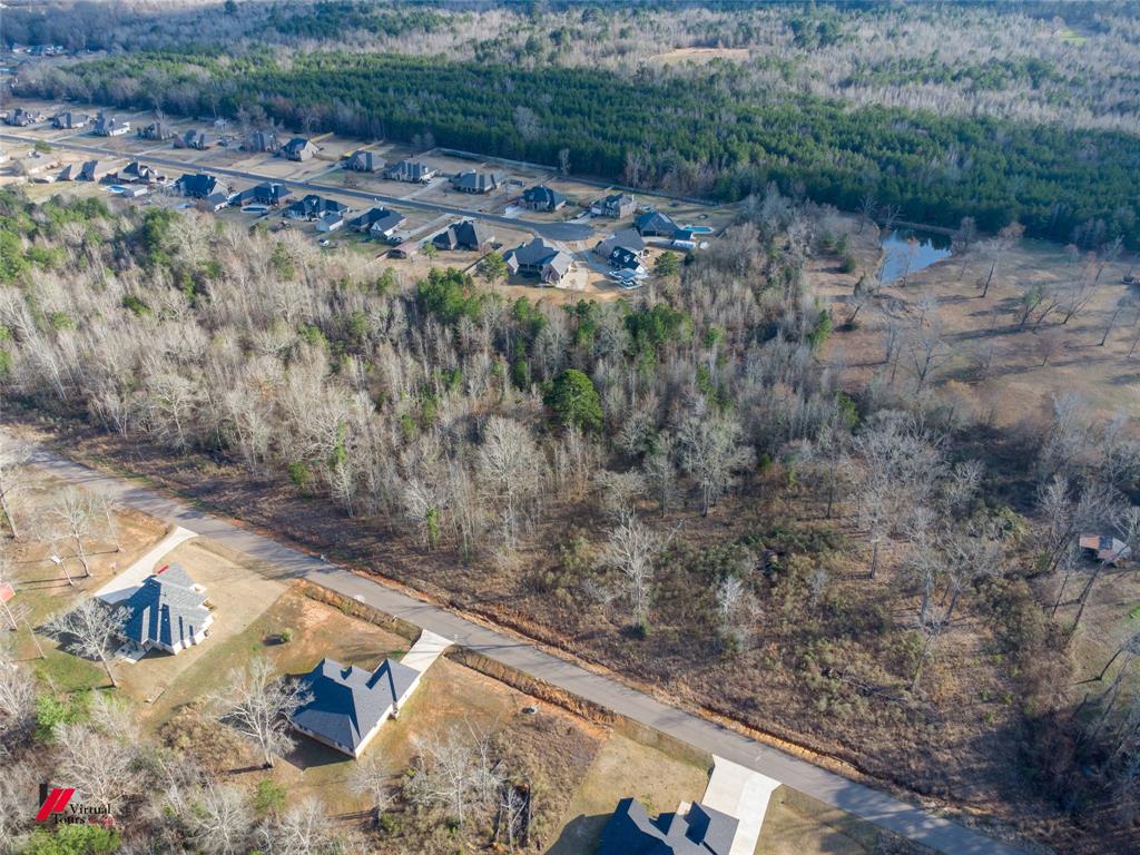 Tbd VOSS Road Stonewall, LA 71078 - Photo 8 of 16 a view of a dry yard with wooden fence