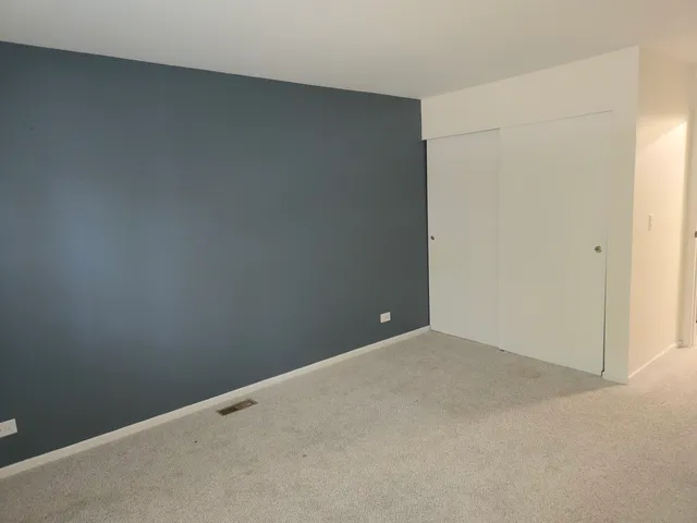 a white bath tub and shower