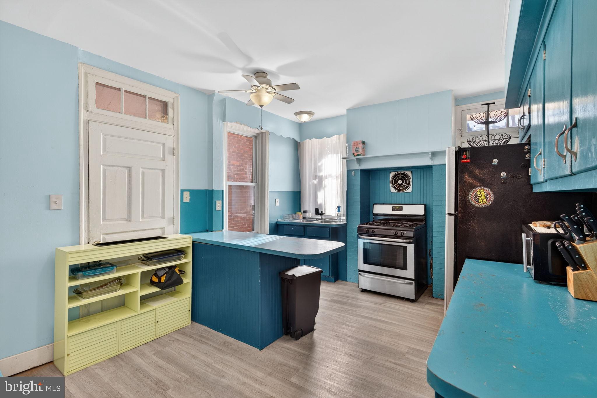 150 East Philadelphia Street York, PA 17401 - Photo 12 of 34 a kitchen with stainless steel appliances a stove top oven and refrigerator
