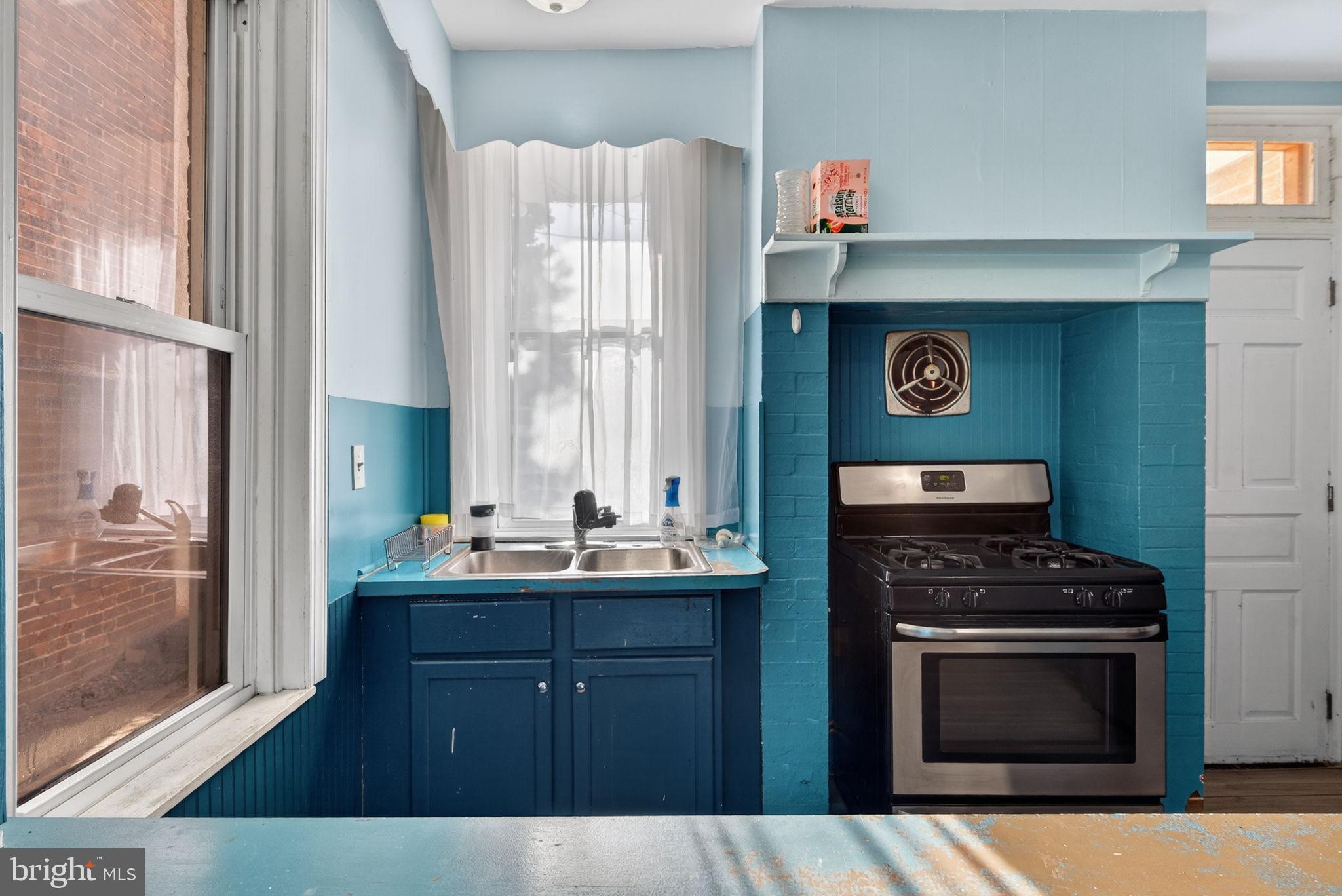 150 East Philadelphia Street York, PA 17401 - Photo 14 of 34 a kitchen with stainless steel appliances a stove and a sink