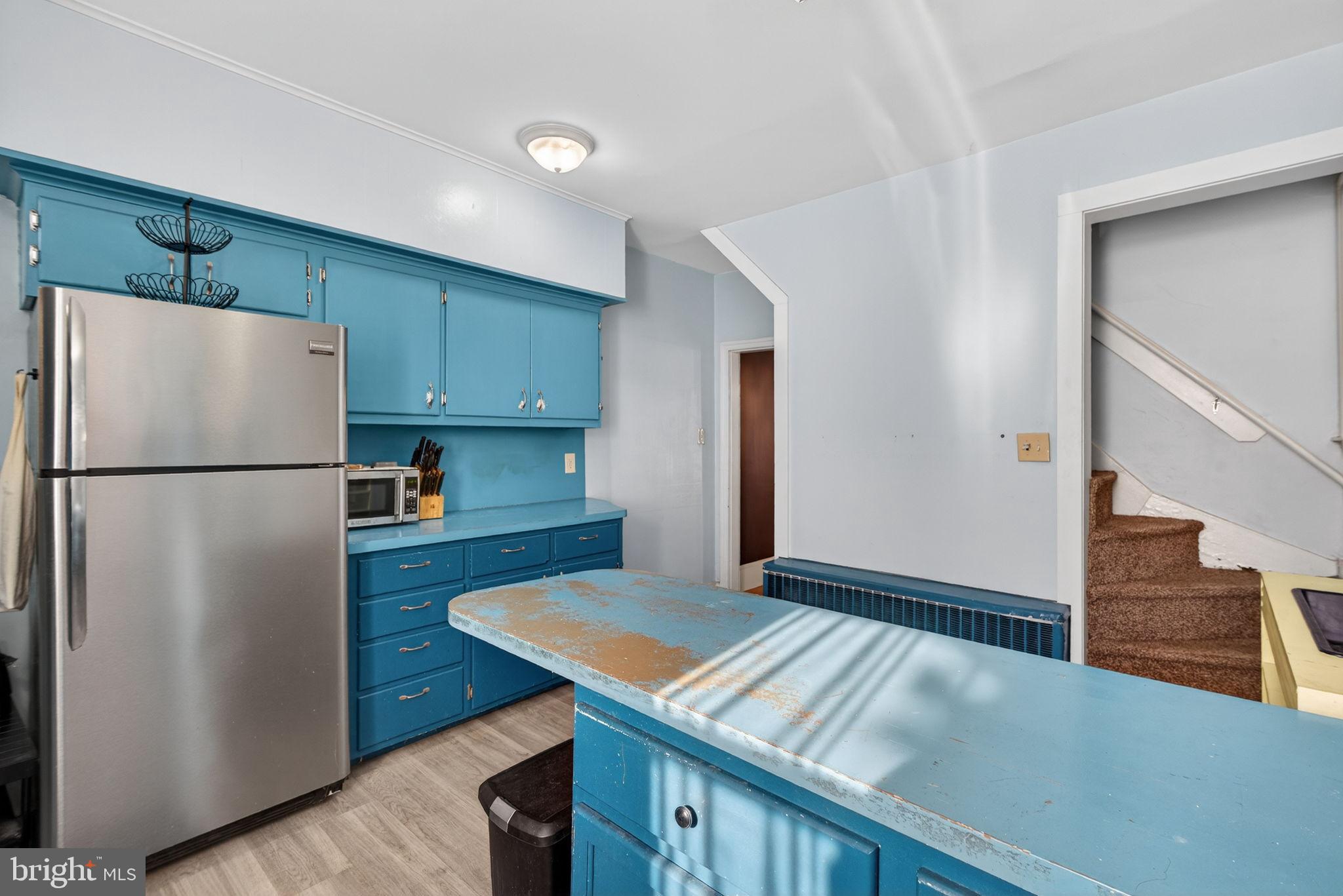 150 East Philadelphia Street York, PA 17401 - Photo 17 of 34 a kitchen with a refrigerator and a stove