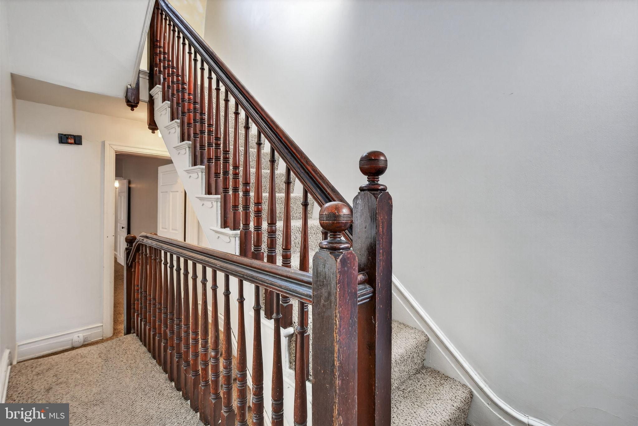 150 East Philadelphia Street York, PA 17401 - Photo 18 of 34 a view of staircase with railing and white walls