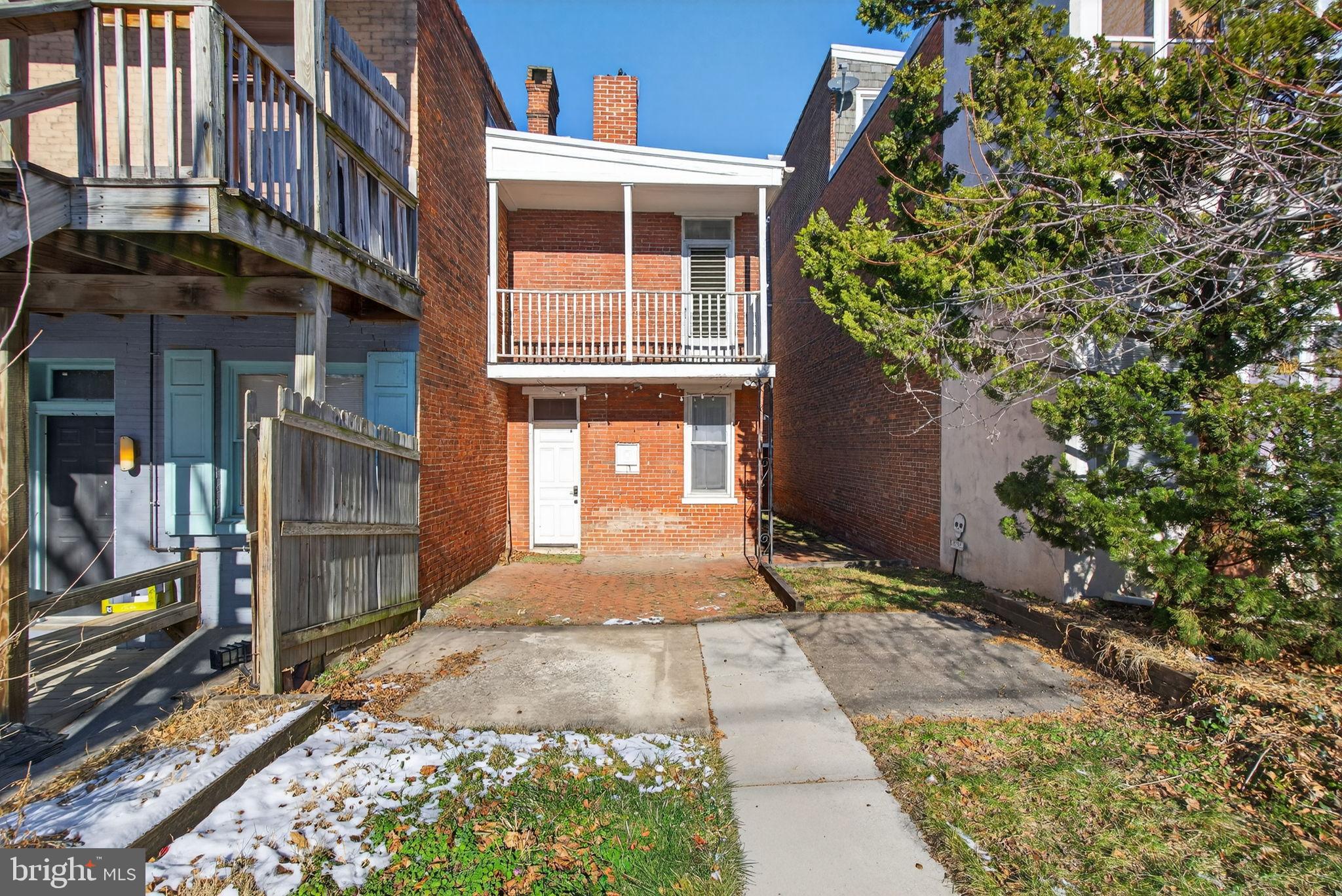 150 East Philadelphia Street York, PA 17401 - Photo 33 of 34 a front view of a house with a yard