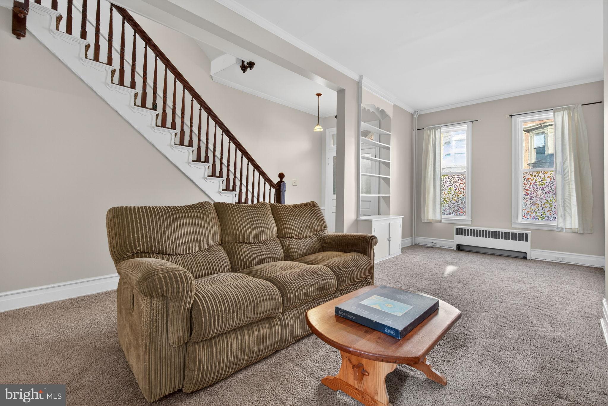 150 East Philadelphia Street York, PA 17401 - Photo 8 of 34 a living room with furniture and a window