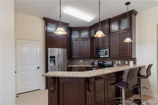 a bathroom with a sink vanity and a mirror