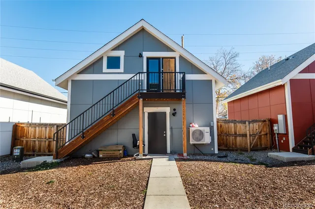 a front view of a house with garage